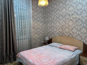 Postel nebo postele na pokoji v ubytování Sesi House