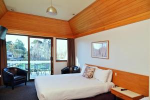 Postel nebo postele na pokoji v ubytování Rosebank Lodge