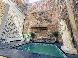Bazén v ubytování Merdeka Kuta Guesthouse nebo v jeho okolí
