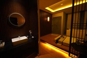 Koupelna v ubytování Grand Villaggio Hotel Abu Dhabi