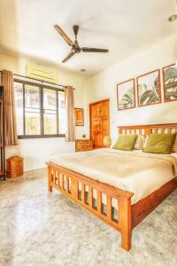Postel nebo postele na pokoji v ubytování Tropical Villa Koh Tao