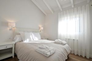 Katil atau katil-katil dalam bilik di Navarra Chic Apartment & Terrace