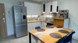 Kuchyň nebo kuchyňský kout v ubytování PORTo MiRA