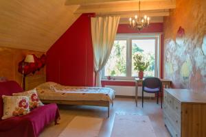 Postel nebo postele na pokoji v ubytování Altmõisa Guesthouse
