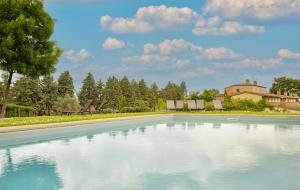 Bazén v ubytování ISA - Luxury Resort with swimming pool immersed in Tuscan nature, apartments with private outdoor area with panoramic view nebo v jeho okolí