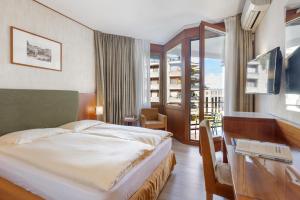 Hotel Delfino Lugano客房内的一张或多张床位