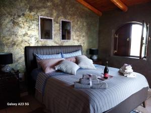Postel nebo postele na pokoji v ubytování Luxury b&b Le Rocce + 37 fotografií