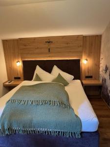 Postel nebo postele na pokoji v ubytování Gartenhaus Zur Kröllin