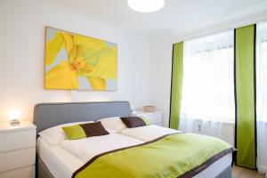 Rúm í herbergi á zimmer-graz