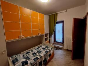 Postel nebo postele na pokoji v ubytování Casetta San Rocco