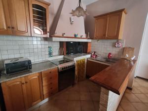 Kuchyň nebo kuchyňský kout v ubytování Casetta San Rocco + 3 fotografie