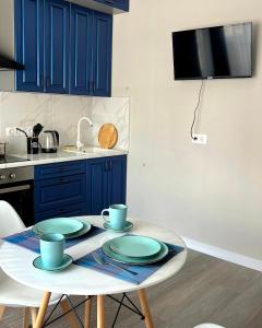 Dapur atau dapur kecil di Athletic City, 1-Room Apartments