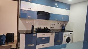 Η κουζίνα ή μικρή κουζίνα στο Premium Apartment In Trivandrum City