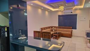 Χώρος καθιστικού στο Premium Apartment In Trivandrum City