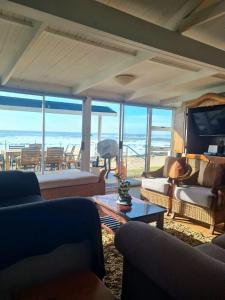Χώρος καθιστικού στο Point Village Accommodation - Hemel op Aarde