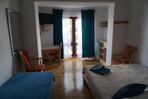 Postel nebo postele na pokoji v ubytování Miramar + 2 fotografie