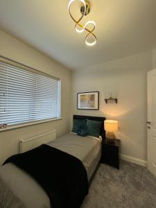 Postelja oz. postelje v sobi nastanitve Modern Double & Single Room with Cozy Vibes Athy