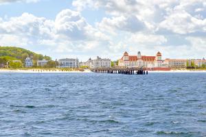 a view of a beach with a pier and buildings at Villa Binz - Apt. 04 in Binz