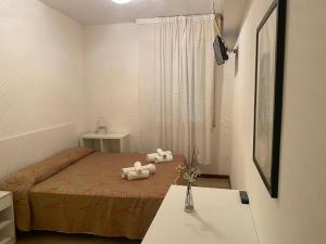 Postel nebo postele na pokoji v ubytování HOTEL LABRADOR