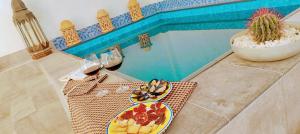 Bazén v ubytování Villa Yandre Garden House - Ayamonte nebo v jeho okolí