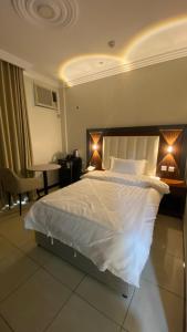 Postel nebo postele na pokoji v ubytování Diva Hotel 2 + 1 fotografie