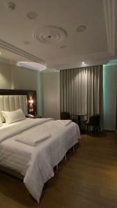 Postel nebo postele na pokoji v ubytování Diva Hotel 2