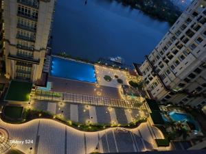 an overhead view of a building in a city at night at Simple Sweet Happy Home in Kuching