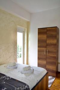 Postel nebo postele na pokoji v ubytování VIK apartman Brzece