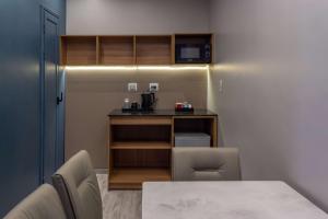Un ou plusieurs lits dans un hébergement de l'établissement Tryp by Wyndham Asuncion