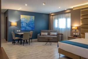 Coin salon dans l'établissement Tryp by Wyndham Asuncion