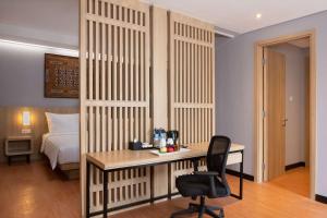 Ein Bett oder Betten in einem Zimmer der Unterkunft Best Western Sagita Hotel Jayapura