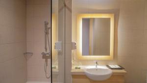 Ein Badezimmer in der Unterkunft Best Western Sagita Hotel Jayapura