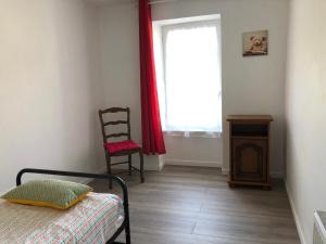 Voodi või voodid majutusasutuse Gîte Sidney toas