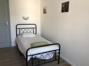 Voodi või voodid majutusasutuse Gîte Sidney toas