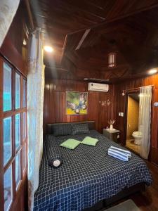 Postel nebo postele na pokoji v ubytování Wangsarai Resort