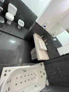 Koupelna v ubytování Complejo de alojamiento kempes Córdoba