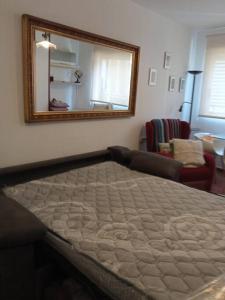 Ένα ή περισσότερα κρεβάτια σε δωμάτιο στο Apartamento Gabucio en Jaén +3 φωτογραφίες