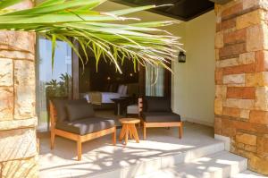 Posezení v ubytování Zimbali condo family room 9