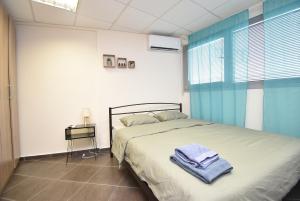 Postel nebo postele na pokoji v ubytování Center4City-Apartment Thessaloniki