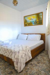 Postel nebo postele na pokoji v ubytování Guesthouse Gogu