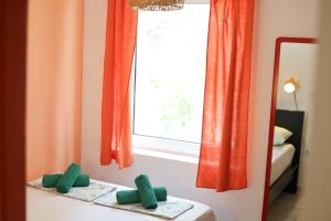 Postel nebo postele na pokoji v ubytování Apartments Silver