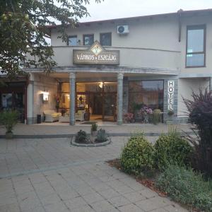 a building with a sign that reads winchesteragency at Vánkos & Eszcájg in Újhartyán
