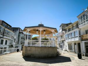 a gazebo in the middle of a city at Precioso estudio en Cedeira. in Cedeira