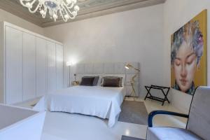 Ένα ή περισσότερα κρεβάτια σε δωμάτιο στο Luxury Apartment with big terrace in Florence