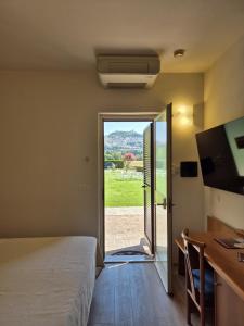 TV a/nebo společenská místnost v ubytování Hotel Bellavista