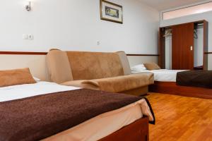 Letto o letti in una camera di Hotel Saraj