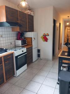 Kuchyň nebo kuchyňský kout v ubytování Ferme de la Porte en Aix