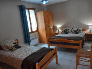 Postel nebo postele na pokoji v ubytování Ferme de la Porte en Aix