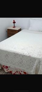 Ένα ή περισσότερα κρεβάτια σε δωμάτιο στο A Ferroviária