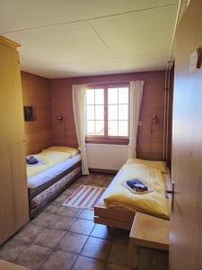 En eller flere senger på et rom på Berggasthaus Höchst